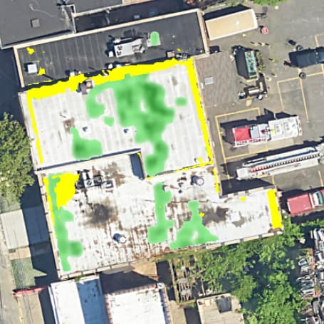 Areas in green show detected sub-surface moisture, areas in yellow show above-surface moisture